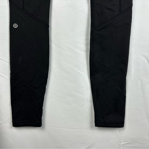 Lululemon Womens Size 6 Speed Tight Solid Black Reflective Pockets - Picture 9 of 9